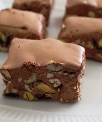 Chocolate nougat candy with nuts.