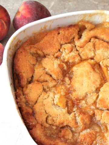 Pan of warm peach cobbler.