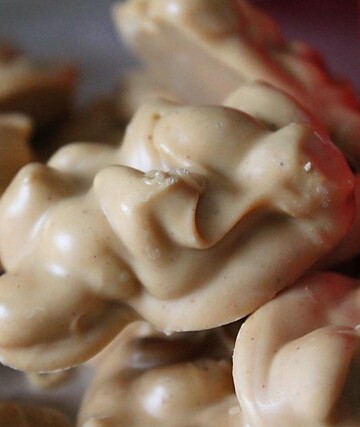 Festive container of peanut cluster candy.