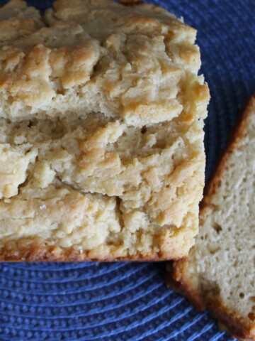 Loaf of honey beer quick bread, sliced.