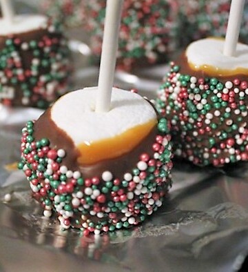 Marshmallows on a stick, dipped in caramel, then chocolate, then rolled in sprinkles.