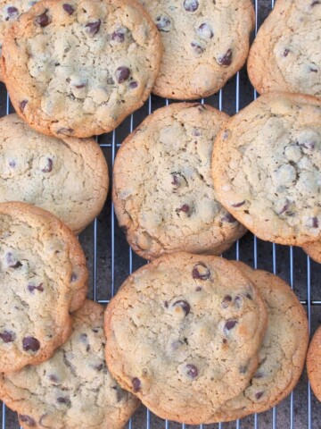 Chocolate Chip cookies on a cooling rack.