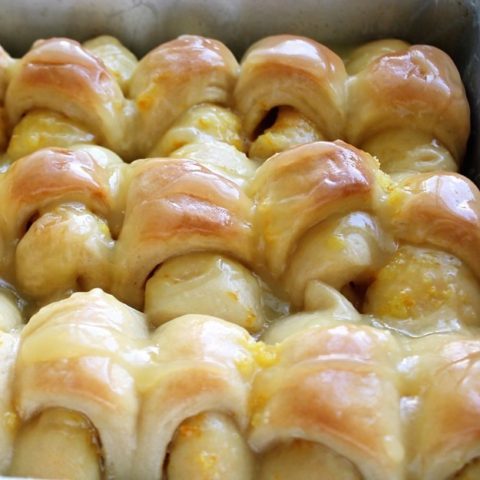 Orange Rolls with a Warm Sour Cream Butter Glaze