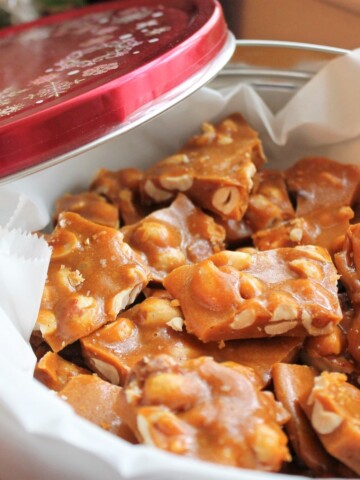 A holiday pan full of peanut brittle.