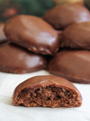 Chocolate cookies with thin chocolate icing.